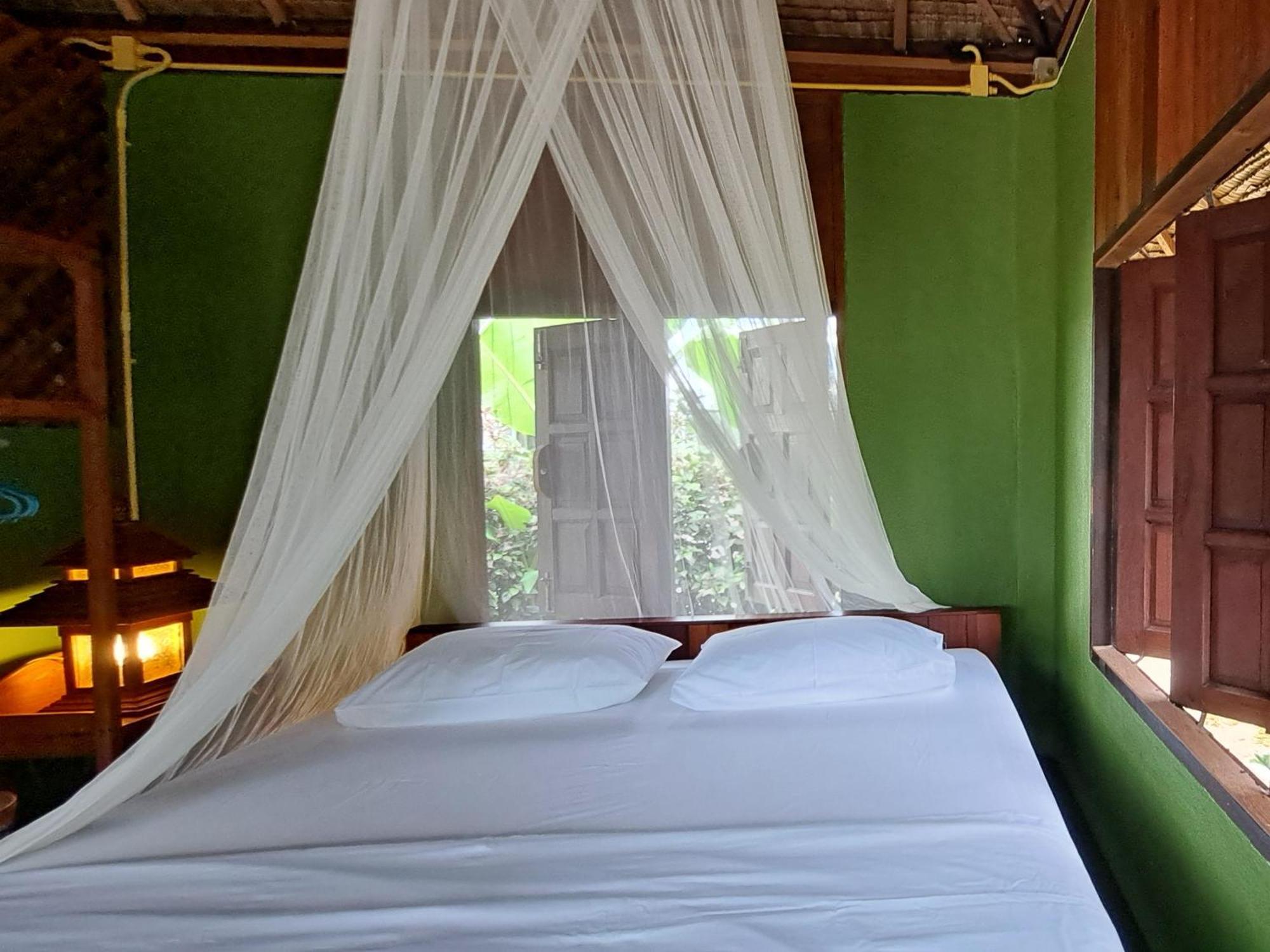 Kham Ecolodge Чиангсен Экстерьер фото